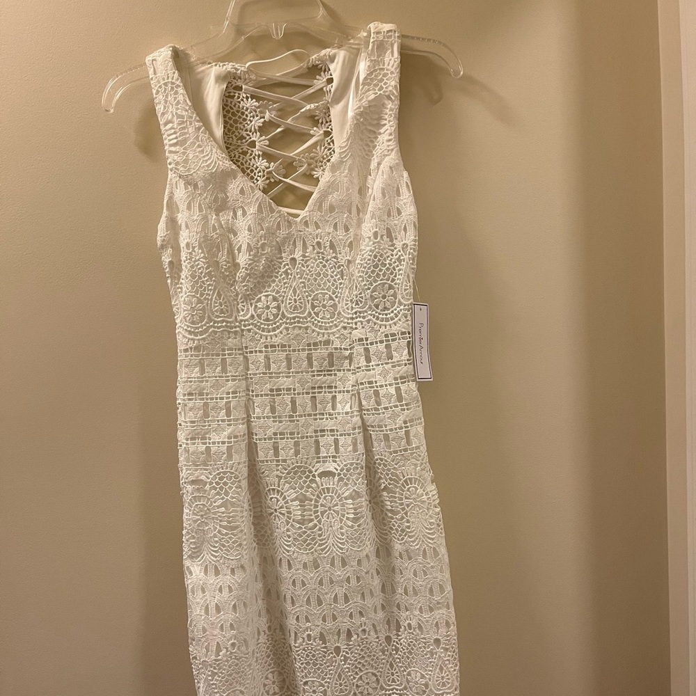 BRAND NEW with tags: white lace dress with ties in back